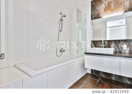 Bright elegant bathroom interior in a luxury house Bright elegant bathroom interior in a luxury house 82021030