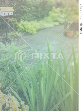 Transparent blurred effect overlay against garden in background 82026602