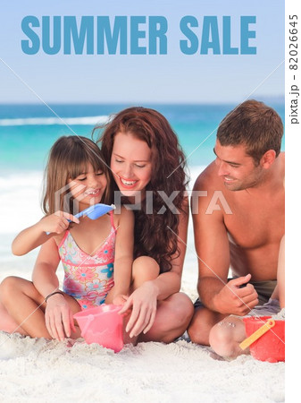Summer sale text over caucasian family enjoying on the beach 82026645