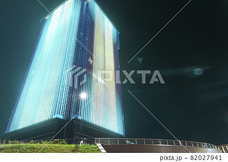 LED outdoor media facade, digital signage screen. Exterior facade light on tall office building, LED wall lamp, architectural media lighting LED outdoor media facade, digital signage screen. Exterior facade light on tall office building, LED wall lamp, architectural media lighting 82027941