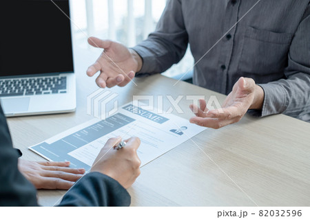 Business people hold a resume and talk to job applicants for job interviews about careers and Her personal history in the company. Recruitment concepts Business people hold a resume and talk to job applicants for job interviews about careers and Her personal history in the company. Recruitment concepts 82032596