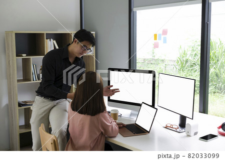 Businessman sharing ideas or startup business plan with colleague. Businessman sharing ideas or startup business plan with colleague. 82033099