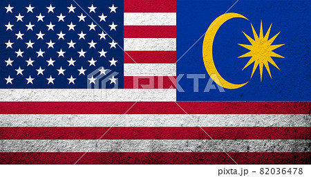 United States of America (USA) national flag with National flag of Malaysia. Grunge background 82036478