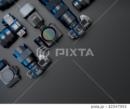 Top view of designer workspace and photography gear on black table background 82047993