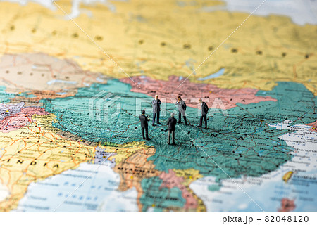 Business people on map of China. Color tone tuned. 82048120