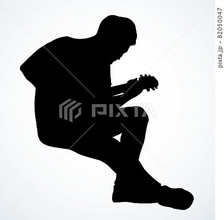 A man plays the guitar. Vector drawing A man plays the guitar. Vector drawing 82050047
