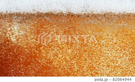 Close up of beer bubbles, abstract texture. 82064944