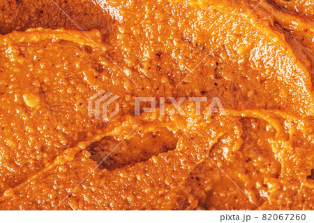 Close-up of peanut butter spread. Food background. Close-up of peanut butter spread. Food background. 82067260