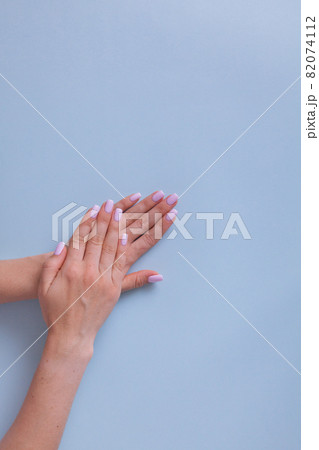 Perfect manicure gel art polish fashion design clean hand woman closeup on isolated background Perfect manicure gel art polish fashion design clean hand woman closeup on isolated background 82074112