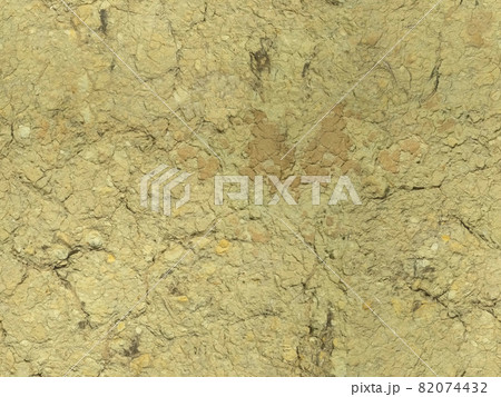 Texture of sand color cracked clay rock. Clay walls with cracks. 82074432