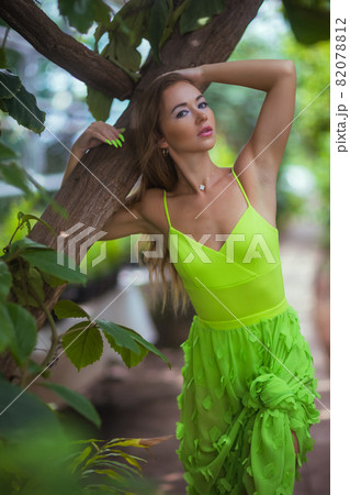 Smiling beauty in garden looking at camera. 82078812
