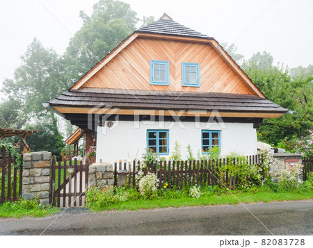 Timbered cottage with a layer of clay on wall and shingle roof. Timbered cottage with a layer of clay on wall and shingle roof. 82083728