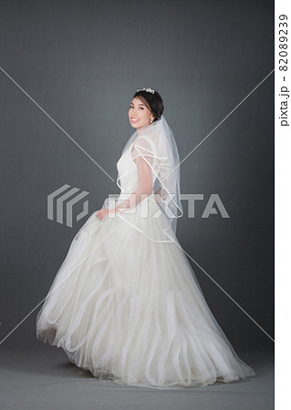 portrait of beautiful bride wearing white wedding dress portrait of beautiful bride wearing white wedding dress 82089239