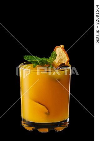 Hot pear and orange winter drink with mint Hot pear and orange winter drink with mint 82091504