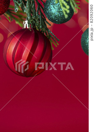 Christmas greeting card, red holiday seasonal mockup background with winter decorations. Copy space. 82092060