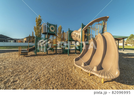 Unusual triple slide in a kids playground Unusual triple slide in a kids playground 82096995
