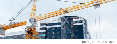 tower crane on the background of the finished building, horizontal frame tower crane on the background of the finished building, horizontal frame 82097367