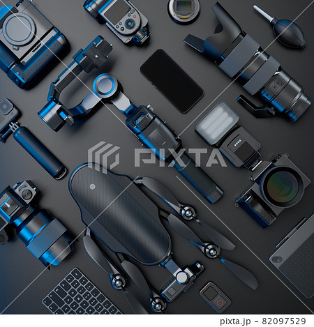 Top view of designer workspace and photography gear on black table background Top view of designer workspace and photography gear on black table background 82097529