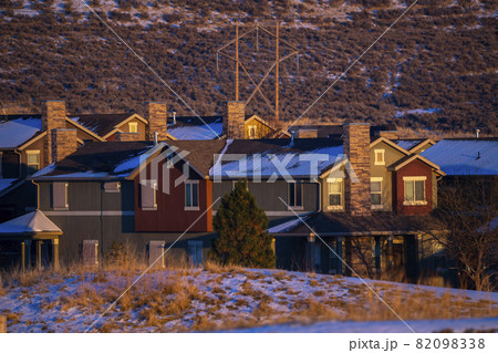 Housing estate at sunset in winter day light Housing estate at sunset in winter day light 82098338