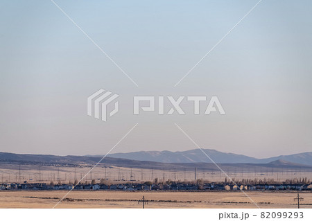 Large housing development at dusk or dawn 82099293