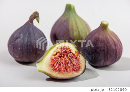 Fresh fig fruits isolated on white background. 82102040