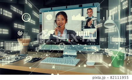 Creative visual of business people in a corporate staff meeting on video call 82111955