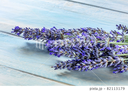 Lavender flower bouquet on a rustic wooden background, lavandula plants 82113179