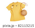 Blank yellow female t-shirt mockup on white isolated background with straw bag. 82113215