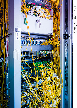 server with connected fiber optic cables server with connected fiber optic cables 82114218