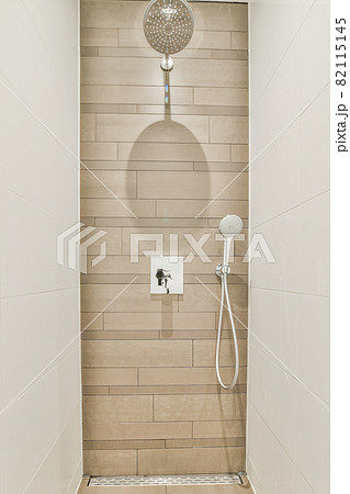 Modern shower stall in a bright bathroom 82115145