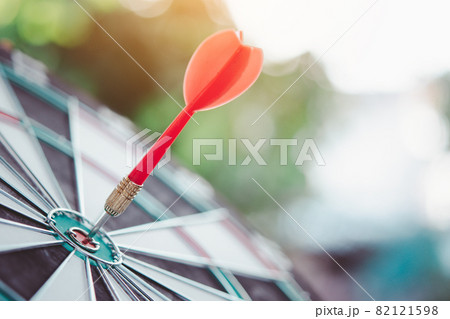 Business marketing success concept. Red dart arrow in center of the target dartboard. Bullseye is a target of business. 82121598