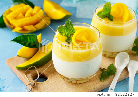 Mango Panna cotta with mango jelly and mint, Italian dessert, homemade cuisine. 82122827