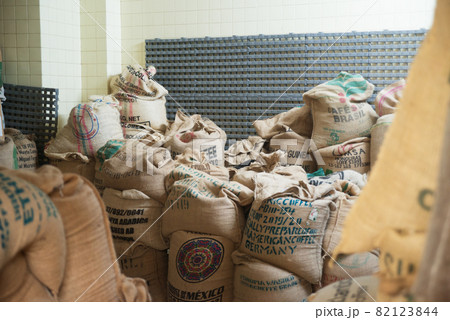 Coffee beans in sacks in warehouse Coffee beans in sacks in warehouse 82123844