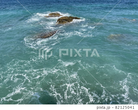 Rocky beach and crystal turquoise water of Ionian Sea in Albania. 82125041