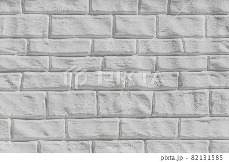 Light gray or white brick wall surface texture background 82131585