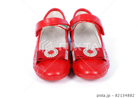 Chilren red shoes on white background. Chilren red shoes on white background. 82134882