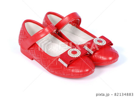 Chilren red shoes on white background. Chilren red shoes on white background. 82134883