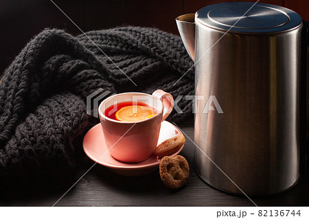 Cup of tea and electrical teapot Cup of tea and electrical teapot 82136744