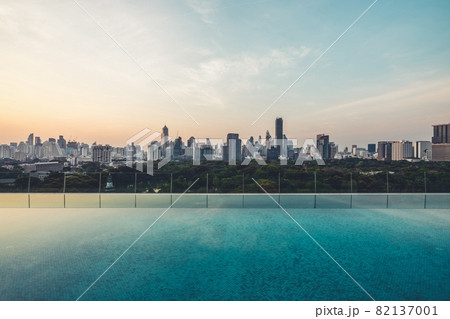Cityscape and high-rise buildings in metropolis city with water reflection 82137001