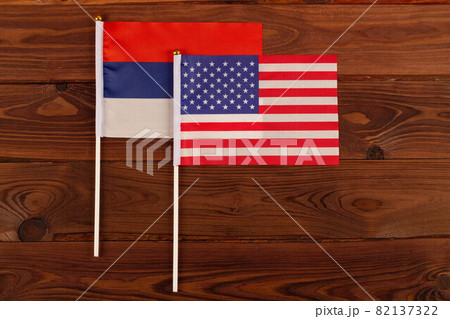 USA flag on the background of the flag of Russia. USA vs Russia. Meeting between the presidents of the United States and Russia. Tensions in relations between the countries are growing USA flag on the background of the flag of Russia. USA vs Russia. Meeting between the presidents of the United States and Russia. Tensions in relations between the countries are growing 82137322
