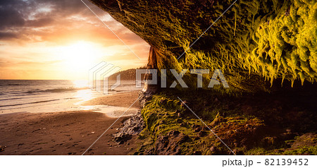 Cave on Mystic Beach on the West Coast of Pacific Ocean. Cave on Mystic Beach on the West Coast of Pacific Ocean. 82139452