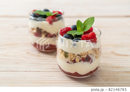homemade raspberry and blueberry with yogurt and granola homemade raspberry and blueberry with yogurt and granola 82146765