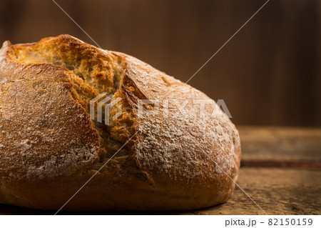 white bread over wooden background 82150159