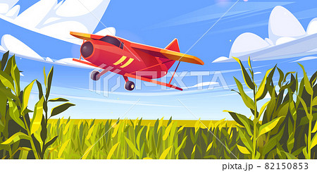 Crop duster plane flying over green corn field Crop duster plane flying over green corn field 82150853