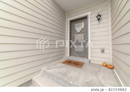 Clean white entrance to an urban houses Clean white entrance to an urban houses 82154662