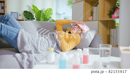 woman has fever at home 82155917
