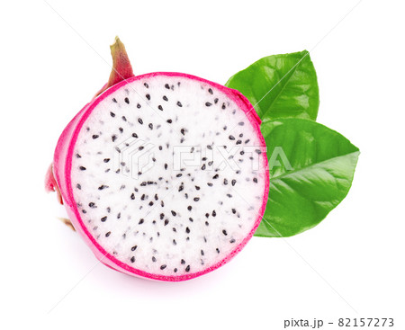 Dragon fruit with green leaves, isolated on white background. Slice of fresh Pitaya or Pitahaya fruit with clipping path. Dragon fruit with green leaves, isolated on white background. Slice of fresh Pitaya or Pitahaya fruit with clipping path. 82157273