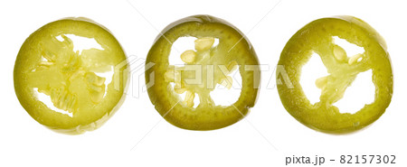 Pickled jalapeno pepper, isolated on white background. Slices of preserved hot serrano. Close up. Top view. 82157302