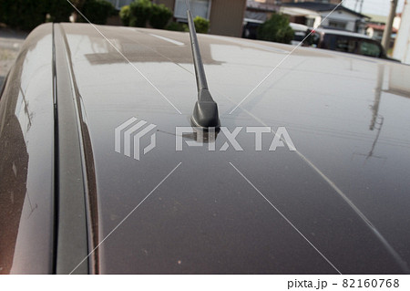 長年洗車をしていない埃と水垢だらけの車の写真素材