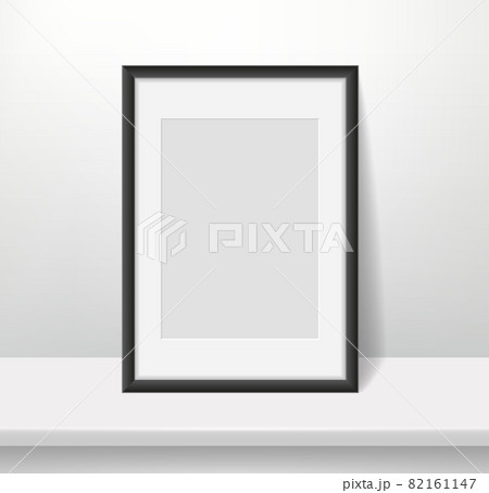 Realistic frame on wall background. Blank framed picture or poster mockup, dark plastic border with paspartu, vertical a4 photo format, interior design accessory, vector concept Realistic frame on wall background. Blank framed picture or poster mockup, dark plastic border with paspartu, vertical a4 photo format, interior design accessory, vector concept 82161147